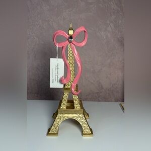 cupcakes & cashmere Gold Eiffel Tower with Pink Bow Decor
